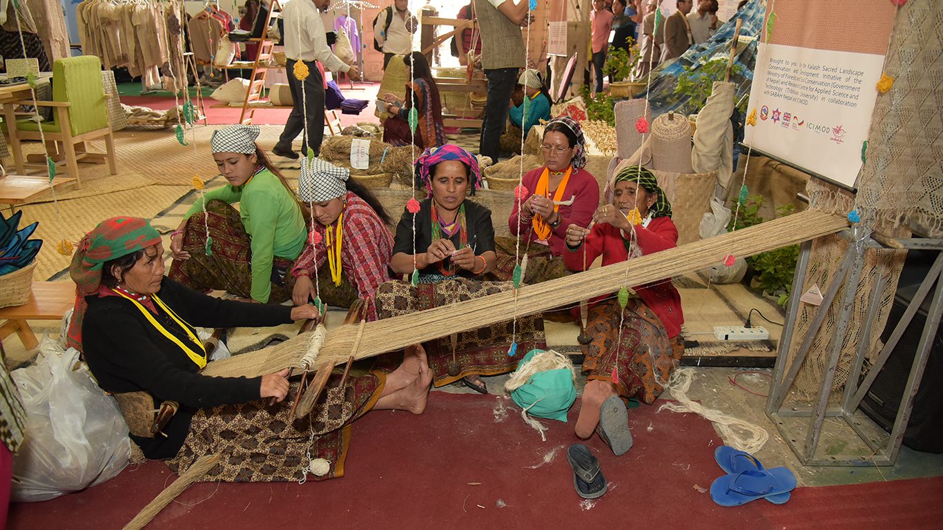 Women being trained to make fabric